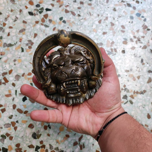 Bronze door knocker like new with lion face for solid door