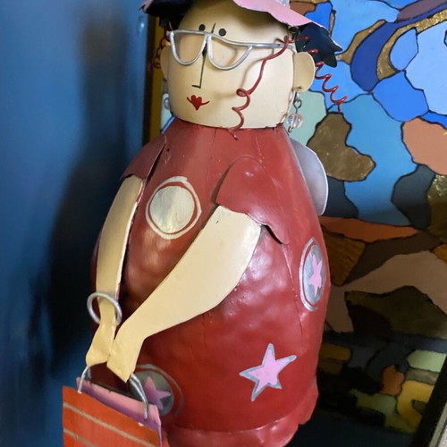 Decorative metal doll with spring like new