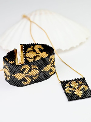 Golden Iris necklace and bracelet custom made, black and gold