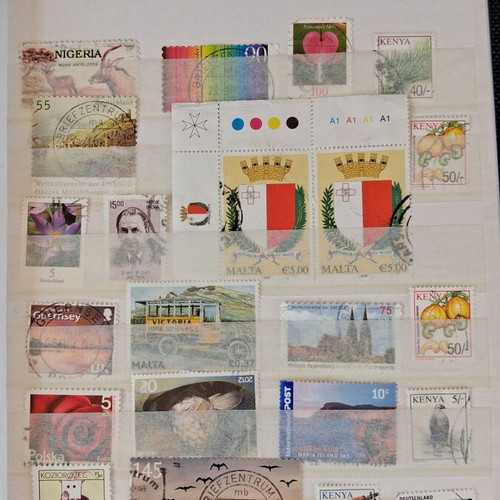Stamp album with used worldwide collection, ideal for beginners