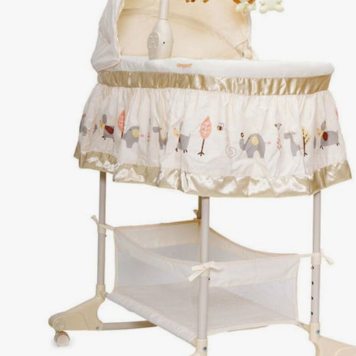 Cangaroo baby bassinet like new with music