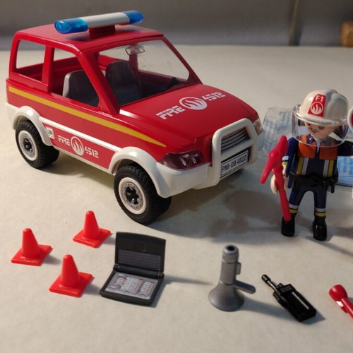 Collectible Playmobil Fire Truck 4822 new with figure 6840