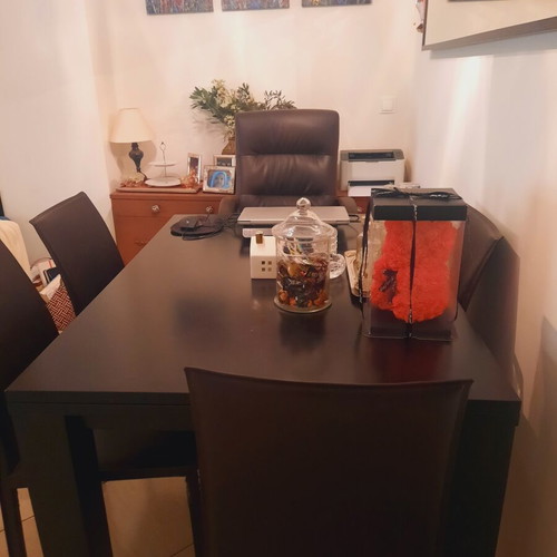 Bo Concept extendable dining table with 4 leather chairs used