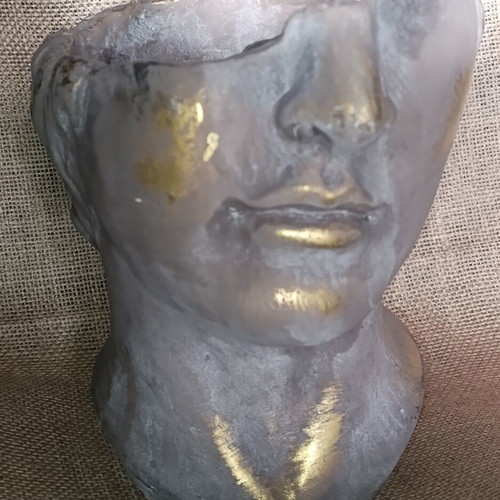 Decorative Face Planter sculpture like new with gold patina