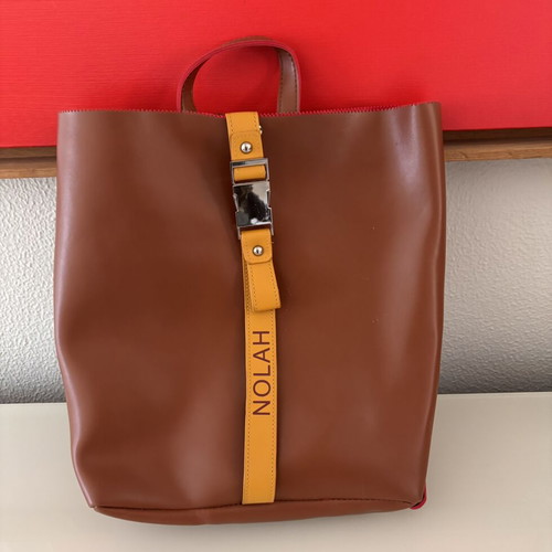 Nolah Backpack like new, brown with yellow strap