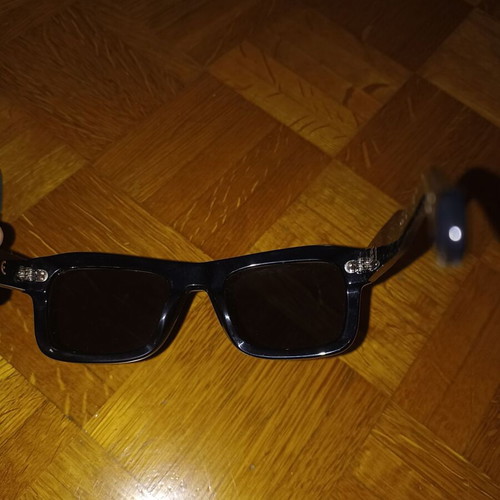 Epos sunglasses new with leather case, black lenses