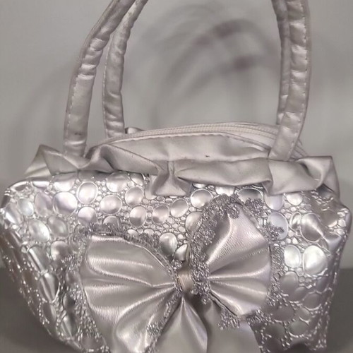 Silver handheld evening bag new, height 23 cm