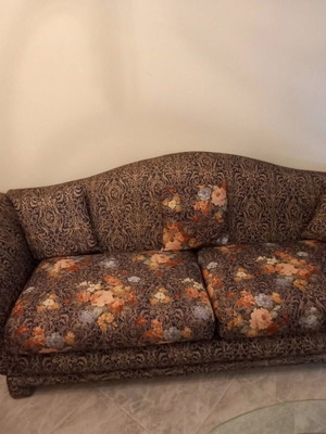 Vintage living room set with 2 sofas, ottoman, and coffee table