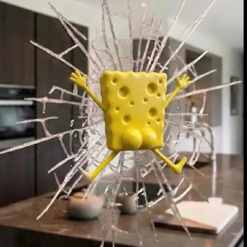 SpongeBob figure with broken glass effect, like new