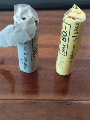 Uncirculated drachma coins new, two rolls with 35 coins each