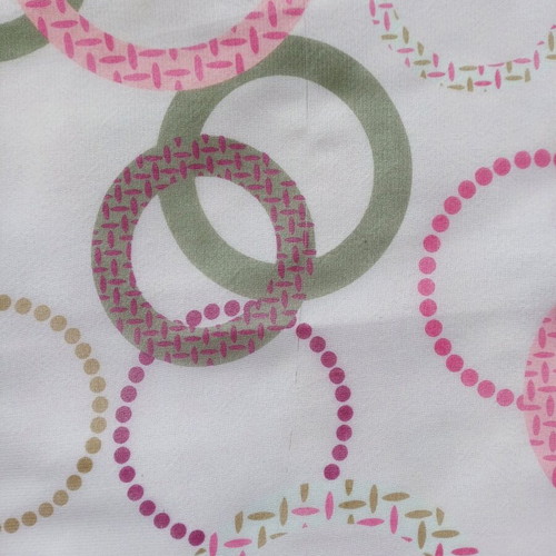Women’s scarf used with geometric pattern in pink and brown
