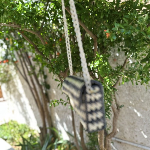 Handmade shoulder bag crossbody with black and gold Missoni-style pattern