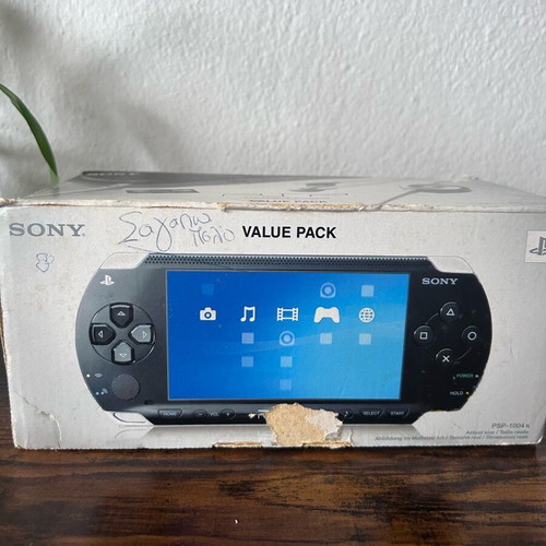 Sony PlayStation Portable PSP-1004 used with original box and accessories