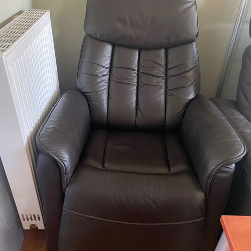 Armchair used, leather with relax function