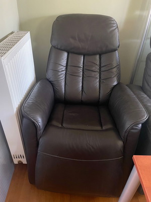 Armchair used, leather with relax function