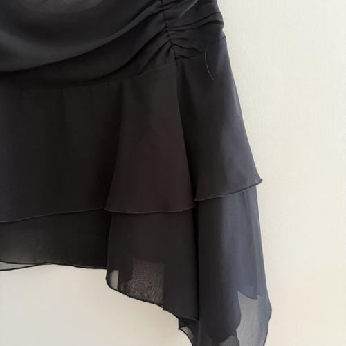 Black airy skirt with ruffles, asymmetrical hem