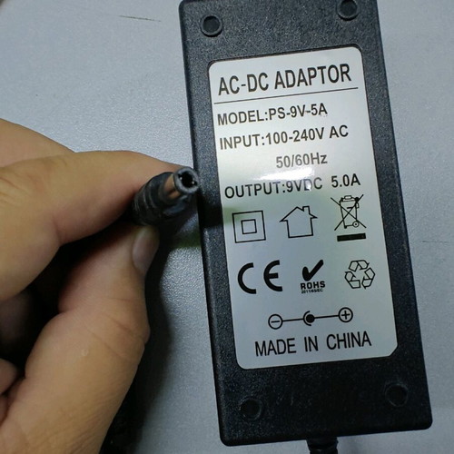 Power supply 9VDC 5A used, tested and functional without 2-pin cable