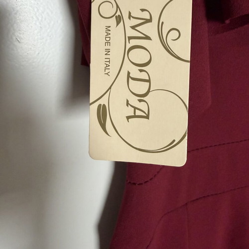 Burgundy jumpsuit with ruffles by Moda new, one size