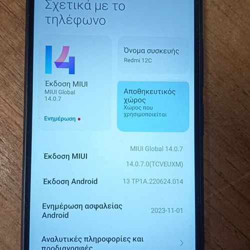 Redmi 12C smartphone used with gift headphones, dual SIM, 32GB
