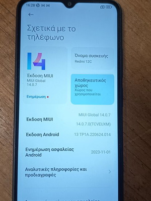 Redmi 12C smartphone used with gift headphones, dual SIM, 32GB