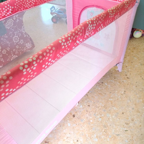 Pink baby playpen used