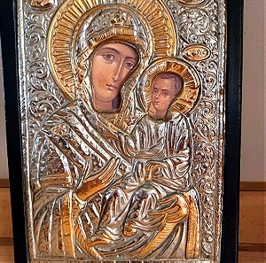 Εικόνα της Παναγίας από αμετάβλητο μέταλλο σε ασημι- χρυσό