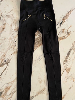 Kids leggings like new, black with gold detail, size S for 13 years old