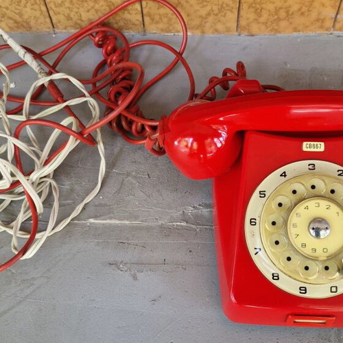 Vintage telephone from 1970s like new, red, wired