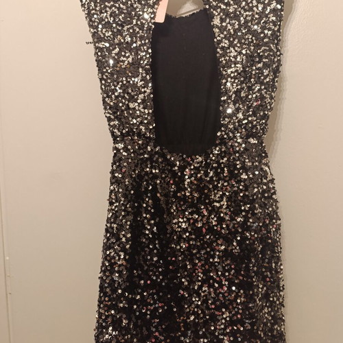Mini dress new with sequins and impressive back, size small, black
