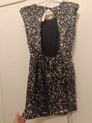 Mini dress new with sequins and impressive back, size small, black
