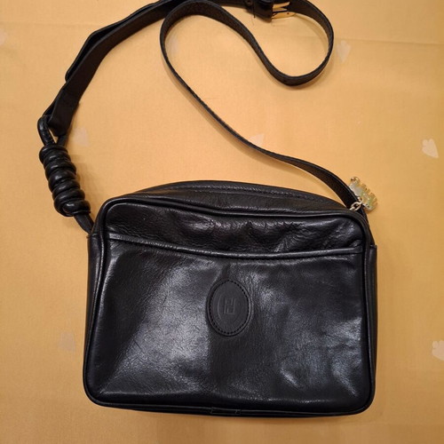 Shoulder bag black genuine leather like new with elephant detail