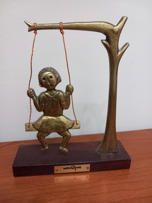 Decorative bronze figure with wooden base, like new