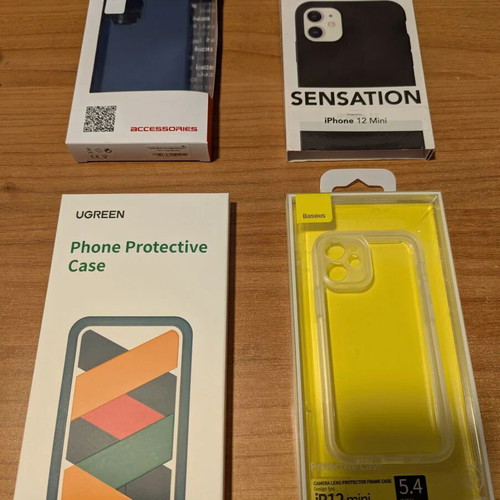 Apple iPhone 12 mini 256GB with 10 cases and battery case