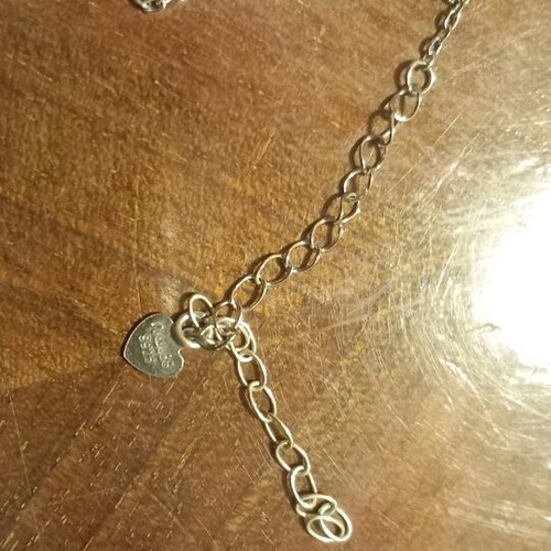 Silver bracelet with stones and infinity symbol like new