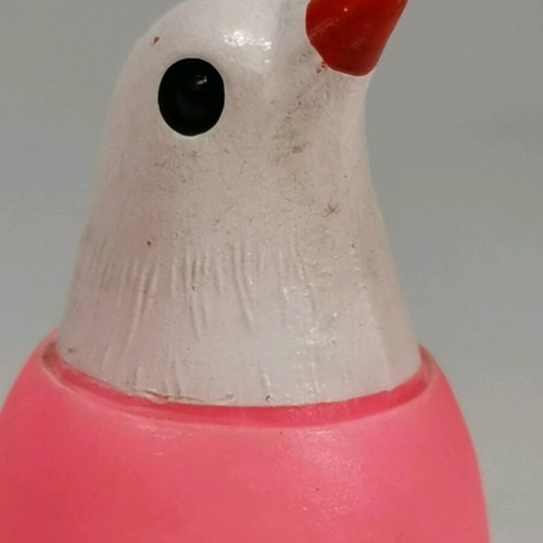 Vintage rubber Easter bird in egg with whistle used