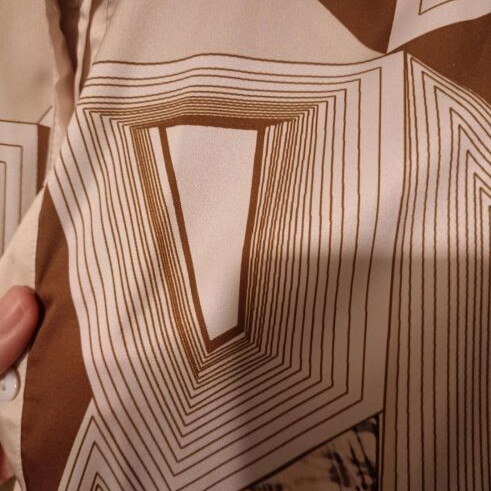 Satin shirt new, beige with geometric patterns