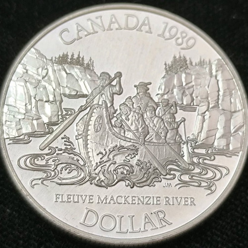 Canada Dollar 1989 commemorative edition like new, silver 23.32g .500