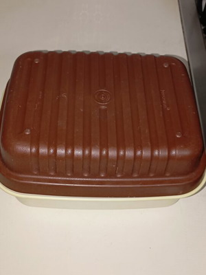 Tupperware cheese container used