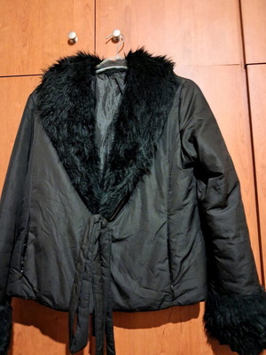 Women's black jacket used with fur collar and waist tie