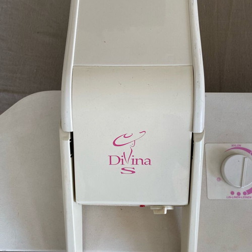 Singer Divina press used, fully functional, with spare parts