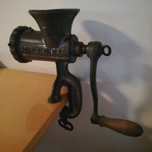 Antique manual decorative meat grinder used