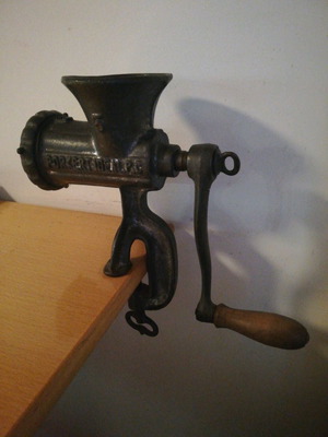Antique manual decorative meat grinder used