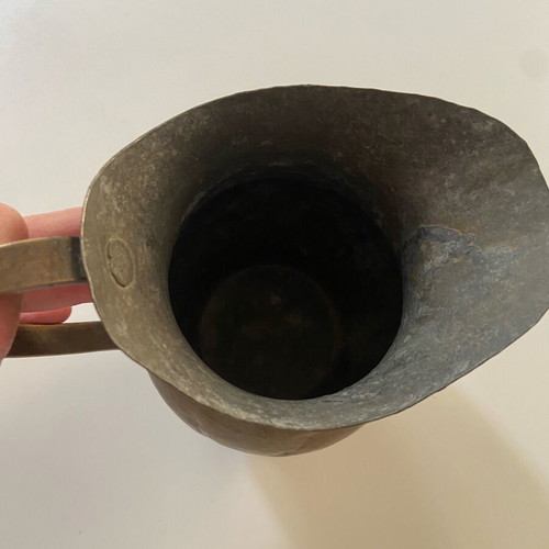Antique brass pitcher