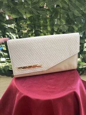 White clutch bag with embossed texture and metal detail like new