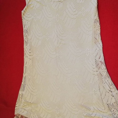 Sleeveless beige blouse dress like new, knitted fabric with lace trim