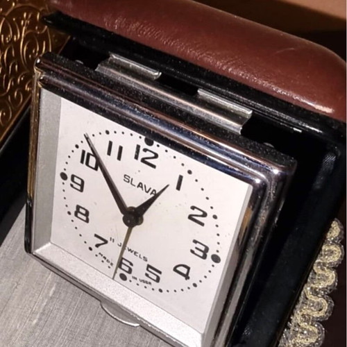 Vintage Slava travel alarm clock like new with leather case
