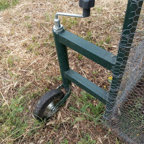 Mobile chicken coop used with automatic timer door