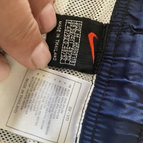 Nike men's swim shorts used, size M, blue and yellow