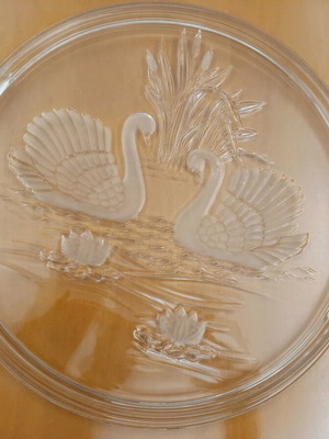 Glass cake stand new with embossed swans