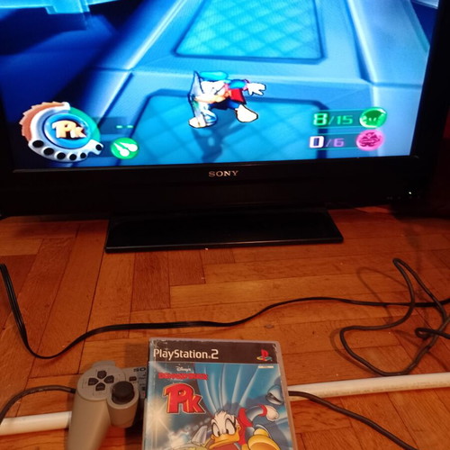 PlayStation 2 (PS2) used with 5 games pack and controller
